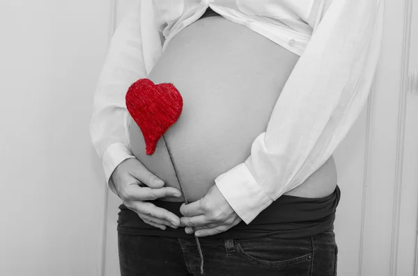 Pregnant woman's belly — Stock Photo, Image