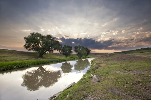 Beautiful summer sunset in the river. — Stock Photo, Image