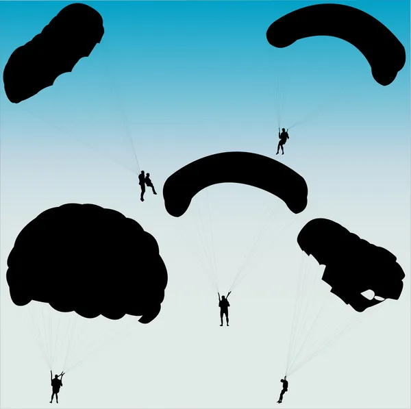 Силуэт парашютистов — стоковый вектор