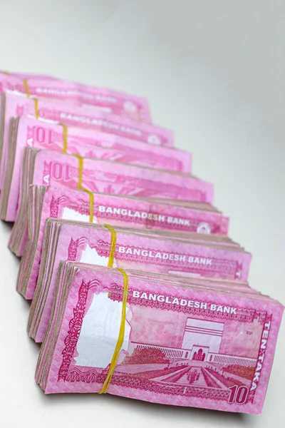 bangladeshi bank note bundle stock on bank