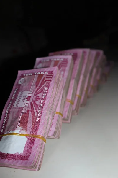 bangladeshi bank note bundle stock on bank