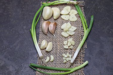 fresh and healthy garlic with tree on kitchen for cooking
