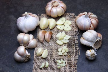 fresh and healthy garlic with cloves stock on kitchen for cooking