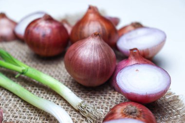 tasty and healthy onion stock with tree on kitchen for cooking