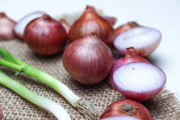 tasty and healthy onion stock with tree on kitchen for cooking