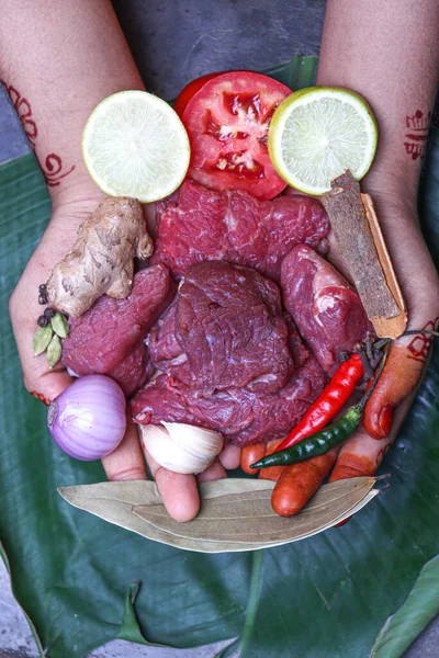 cow beef with spice and lemon on hand for cooking