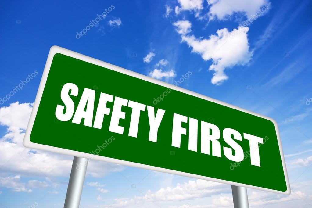 Safety first sign over blue sky