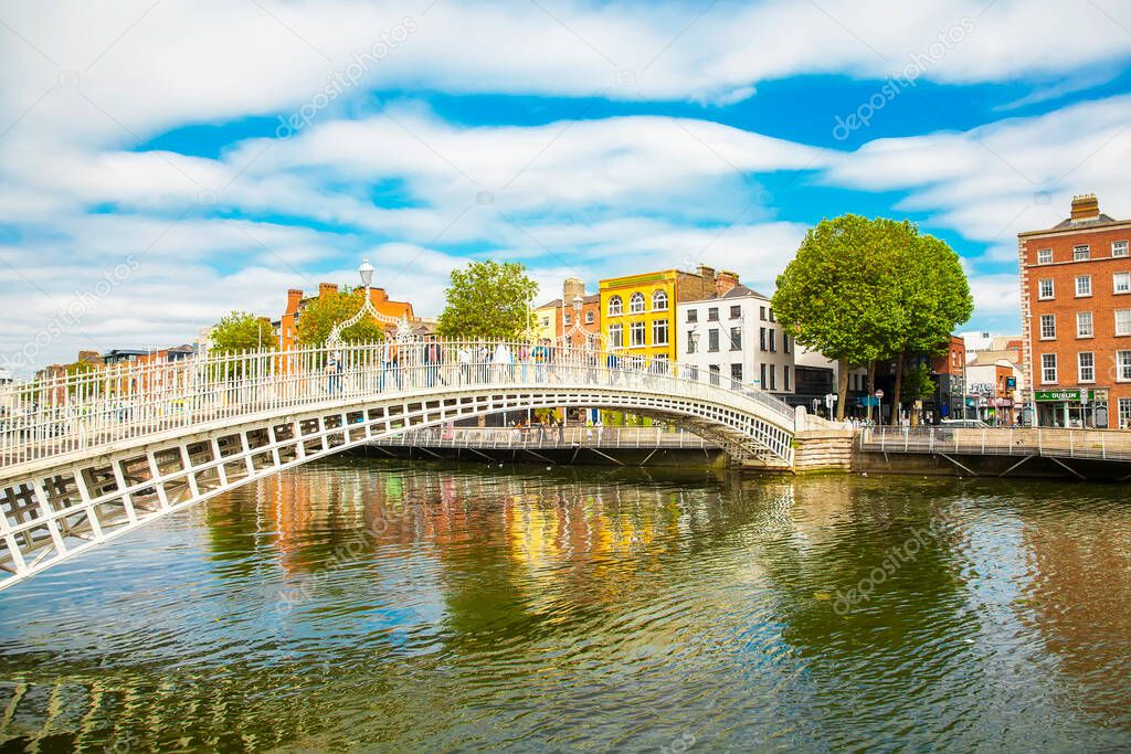 Ha'penny Bridge and Liffey river in Dublin, Ireland