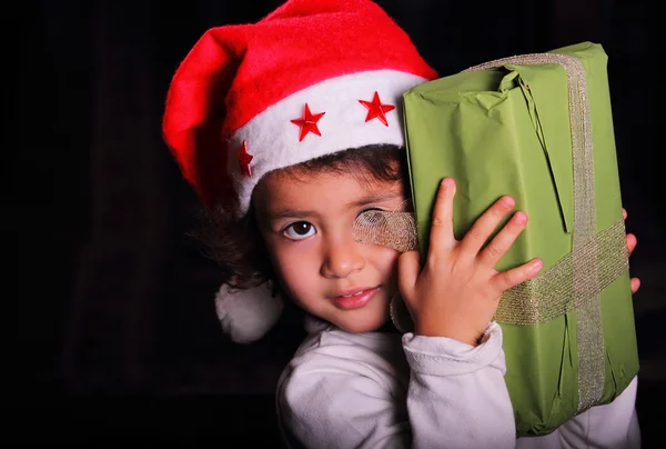 Christmas child portrait in low key — Stock Photo, Image