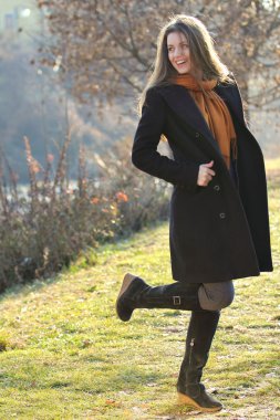 Joyful model having fun outdoor in the park