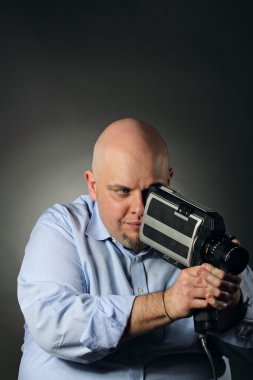 vintage videocamera olan adam