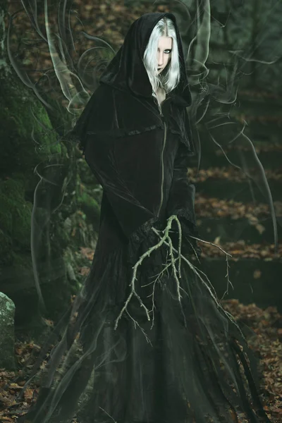 Emanation of dark powers from a forest witch — Stock Photo, Image