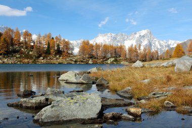 Panoramic view of Arpy lake in autumn clipart