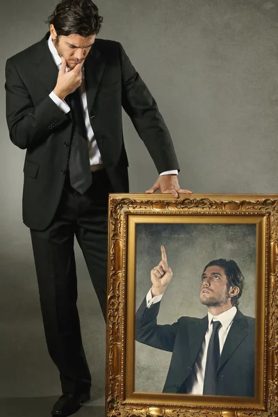 El hombre elegante y su conciencia en una pintura —  Fotos de Stock