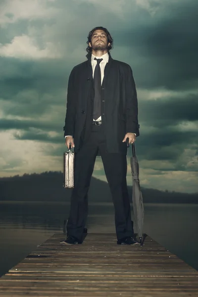 Businessman is ready for the storm coming — Stock Photo, Image