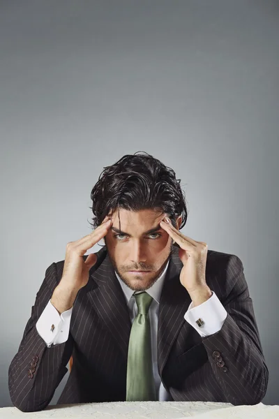 Handsome businessman with worried expression — Stock Photo, Image