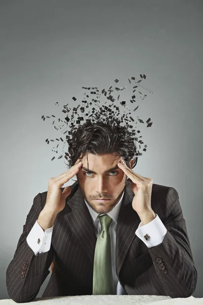 Businessman with scattered mind — Stock Photo, Image