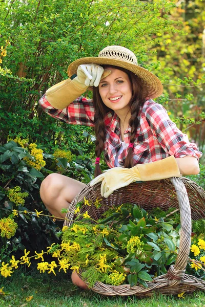 Happy young woman with hay hat — Stock Photo, Image