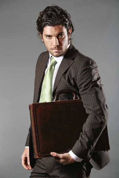 Fashion business model posing with briefcase — Stock Photo, Image