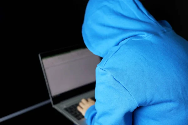 Cybercrime Hacking Technology Crime Unrecognizable Hacker Blue Hoodie Sitting Laptop —  Fotos de Stock