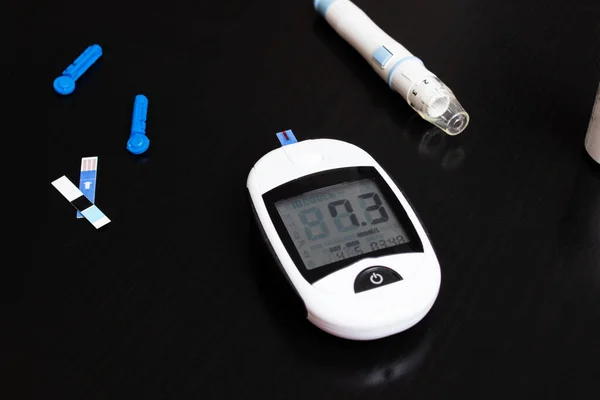 Fingerstick glucose meter Stock Photos, Royalty Free Fingerstick ...