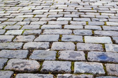 Gri taşlardan kaldırım taşları yakın, arkaplan ya da doku