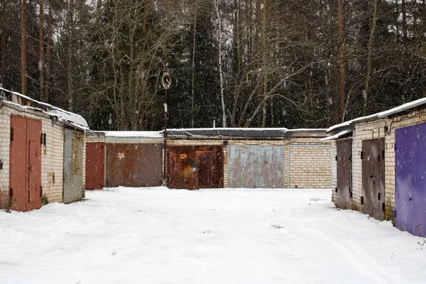 Garage doors in a row in the snow — Stock Photo, Image