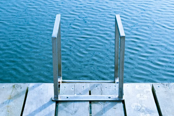 A ladder leading down to the sea — Stock Photo, Image