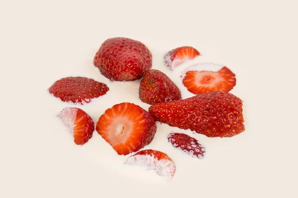 Strawberries in milk and cream — Stock Photo, Image