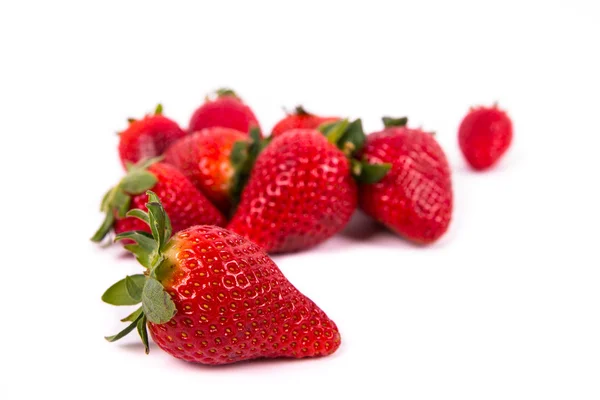 A group of several ripe red strawberries — Stock Photo, Image