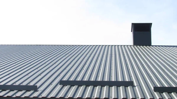 metal profile. roofing. replacement of coating for the house. roof repair