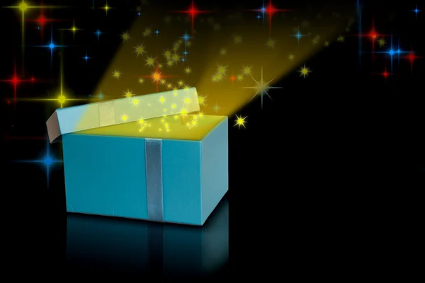 Open gift with fly stars — Stock Photo, Image