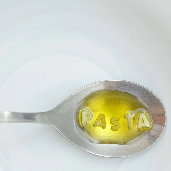Alfabet vormige pasta vorming van het woord — Stockfoto