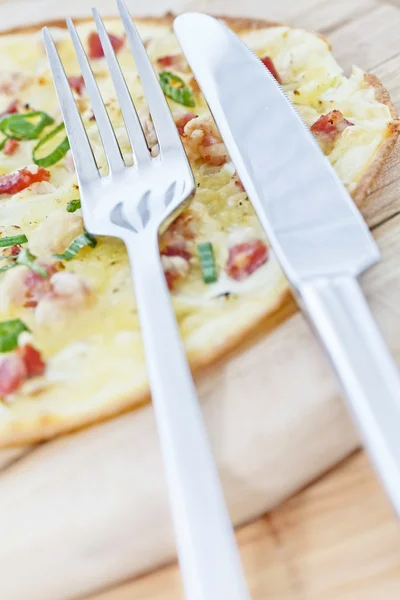 Tarte flambee with fork on wooden — Stock Photo, Image