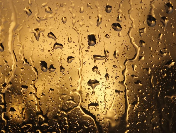Νερό σταγόνες βροχής στο γυαλί — Φωτογραφία Αρχείου