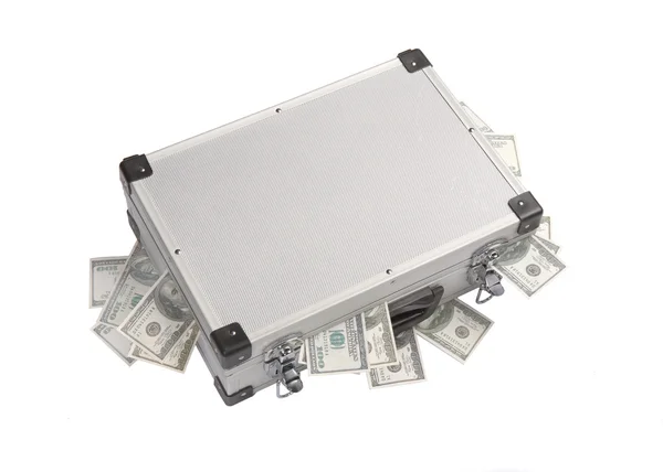 Notas de dólar a sair de uma mala de alumínio — Fotografia de Stock
