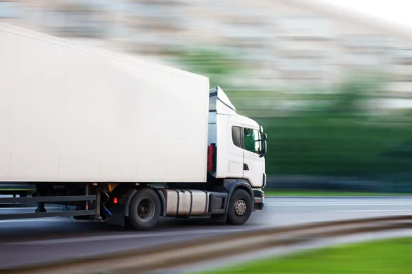 Truck goes on the city street — Stock Photo, Image