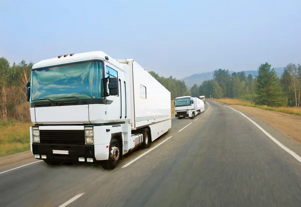 Three trucks — Stock Photo, Image