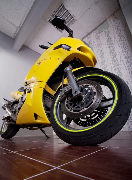 Motorcycle in garage — Stock Photo, Image