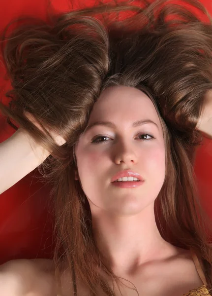 Girl with hair round the head — Stock Photo, Image