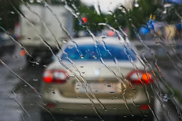 Street through rain drops — Stock Photo, Image