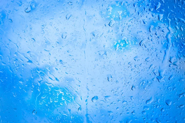 Gotas de chuva no vidro do carro — Fotografia de Stock