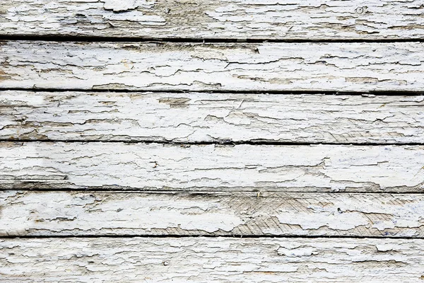 Planken bedekt met witte gebarsten verf — Stockfoto