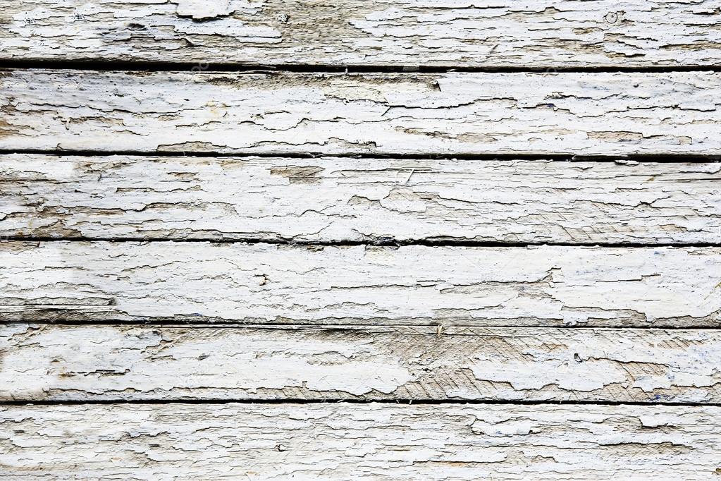 boards covered with white cracked paint