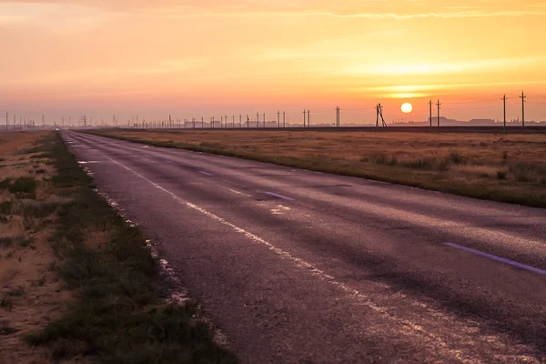 Tramonto sulla strada statale — Foto Stock