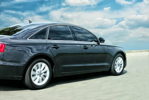 Black Car Moves Highway — Stock Photo, Image