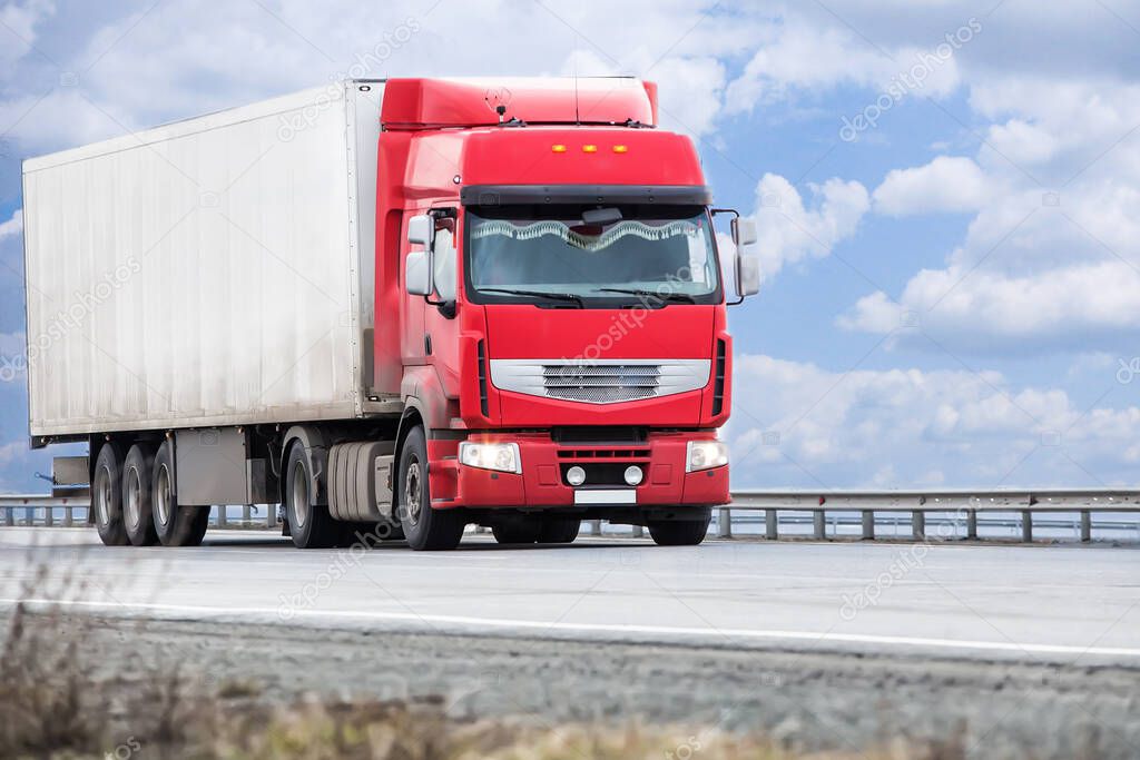 truck transports freight on the country highway