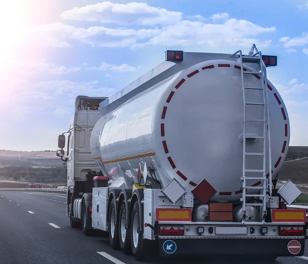Big Gas Tank Truck Goes Highway Stock Picture