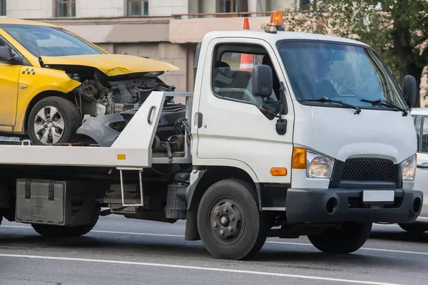 Tow Truck Transporting Broken Taxi Car Close Roadside Assistance Stock Image