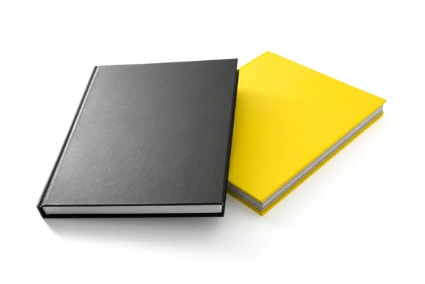 Boş Kapaklar üzerinde beyaz izole ile iki kitap (sarı ve siyah) — Stok fotoğraf